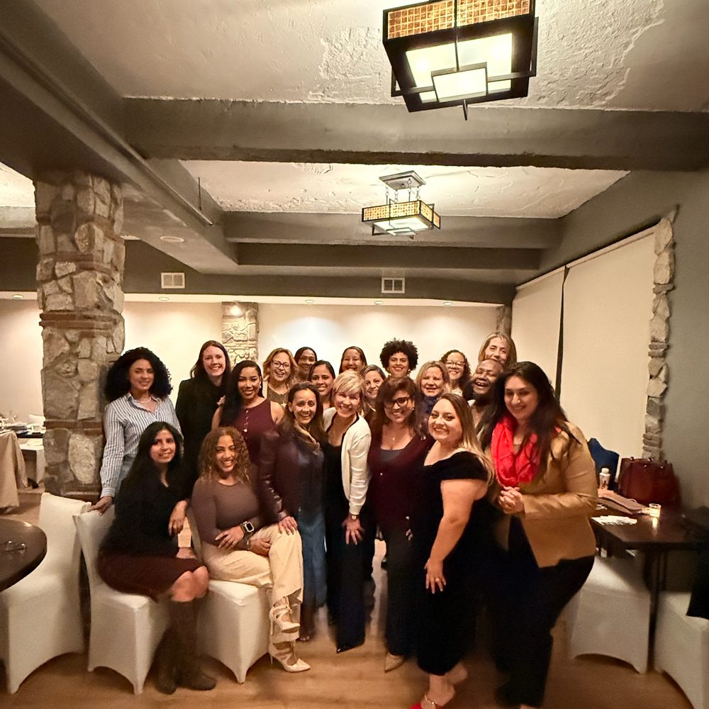 Women gathered together at a previous Maria's Circle dinner